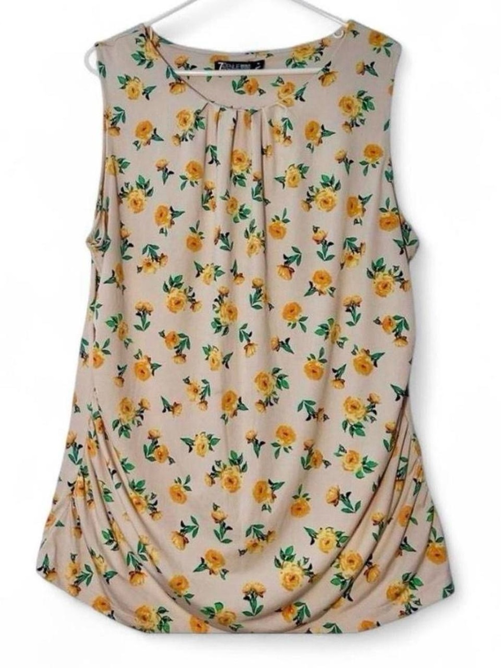 Cream and yellow sleeveless floral print blouse